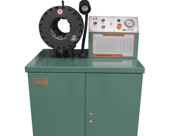 A green high pressure hose crimping machine (type M) PLC type.